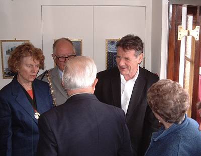 Michael Palin chatting with invited guests