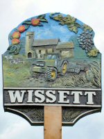 Wissett Village Sign. Photograph taken by Tim and Eileen
                    Heaps, June 2004