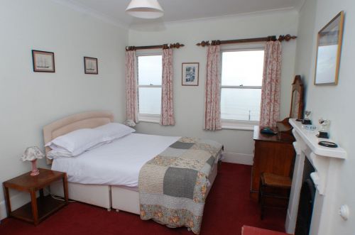 There are two double bedrooms - this one on the second floor has magnificent views over the beach and pier