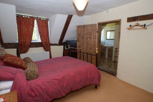 The second Bedroom, with en-suite beyond.