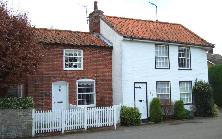 The Henham Estate built the pair of cottages, clearly
                from odds and ends as the roof was half tile and half slate